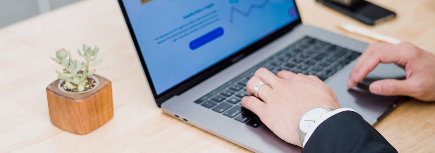 Accounting and payroll work on a laptop